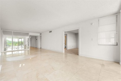 Move-in ready condo in the heart of Palm Aire featuring two en on Palm-Aire Country Club and Resort - The Oaks in Florida - for sale on GolfHomes.com, golf home, golf lot