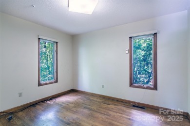 Spacious 3BR/2.5BA home in the gated Connestee Falls community! on Connestee Falls Golf Club in North Carolina - for sale on GolfHomes.com, golf home, golf lot