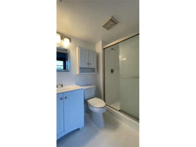 Spacious 2/2 condo in the desirable 55+ community of Palm on Oriole Golf and Tennis Club in Florida - for sale on GolfHomes.com, golf home, golf lot