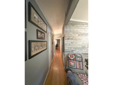 If you are looking for a smaller house with a big big yard on a on Cherokee Village North Course in Arkansas - for sale on GolfHomes.com, golf home, golf lot