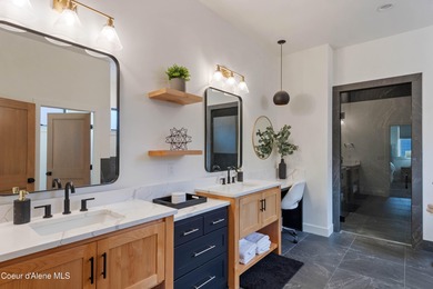 Designed for modern living, this custom craftsman home built in on Hayden Lake Country Club in Idaho - for sale on GolfHomes.com, golf home, golf lot