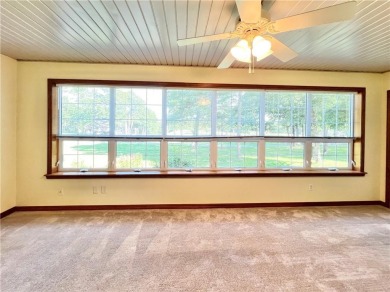 Immaculate home overlooking the beautiful 18 hole golf course on Holiday Island Golf Course in Arkansas - for sale on GolfHomes.com, golf home, golf lot