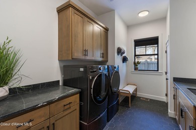 Designed for modern living, this custom craftsman home built in on Hayden Lake Country Club in Idaho - for sale on GolfHomes.com, golf home, golf lot