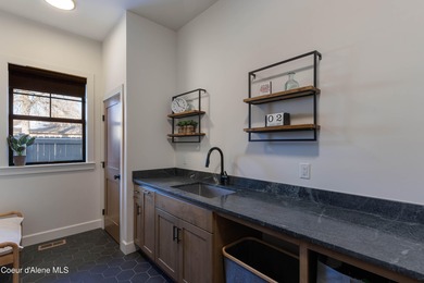 Designed for modern living, this custom craftsman home built in on Hayden Lake Country Club in Idaho - for sale on GolfHomes.com, golf home, golf lot