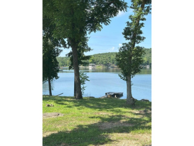 If you are looking for a smaller house with a big big yard on a on Cherokee Village North Course in Arkansas - for sale on GolfHomes.com, golf home, golf lot