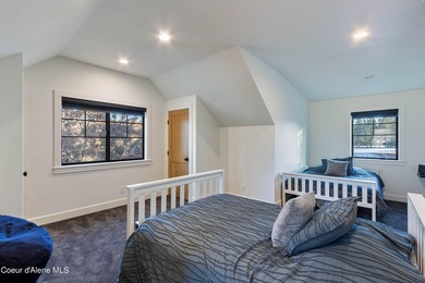 Designed for modern living, this custom craftsman home built in on Hayden Lake Country Club in Idaho - for sale on GolfHomes.com, golf home, golf lot