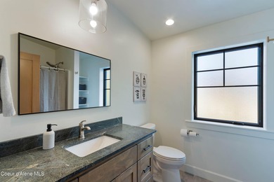 Designed for modern living, this custom craftsman home built in on Hayden Lake Country Club in Idaho - for sale on GolfHomes.com, golf home, golf lot