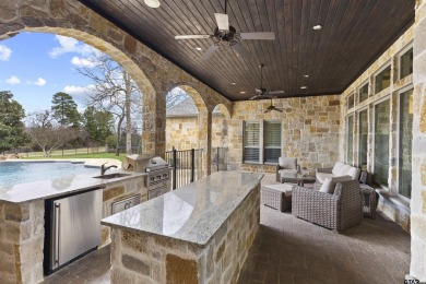 Welcome to this stunning home nestled on a spacious half-acre on Hollytree Country Club in Texas - for sale on GolfHomes.com, golf home, golf lot