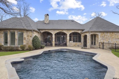 Welcome to this stunning home nestled on a spacious half-acre on Hollytree Country Club in Texas - for sale on GolfHomes.com, golf home, golf lot