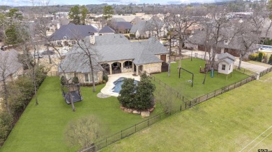 Welcome to this stunning home nestled on a spacious half-acre on Hollytree Country Club in Texas - for sale on GolfHomes.com, golf home, golf lot