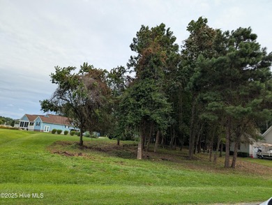 Lovely wooded lot located in Albemarle Plantation, the gated on Sound Golf Links at Albemarle Plantation in North Carolina - for sale on GolfHomes.com, golf home, golf lot
