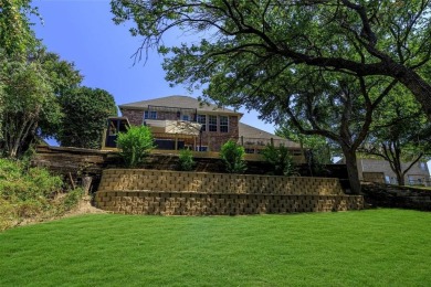 WOW! This home backs to a private creek, a huge deck that will on Eagle Mountain Country Club  in Texas - for sale on GolfHomes.com, golf home, golf lot