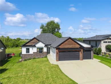 Welcome home to this beautiful 4 bedroom, 3 bath ranch retreat on Toad Valley Public Golf Course in Iowa - for sale on GolfHomes.com, golf home, golf lot