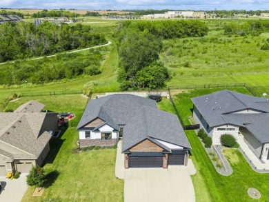 Welcome home to this beautiful 4 bedroom, 3 bath ranch retreat on Toad Valley Public Golf Course in Iowa - for sale on GolfHomes.com, golf home, golf lot