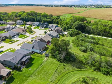 Welcome home to this beautiful 4 bedroom, 3 bath ranch retreat on Toad Valley Public Golf Course in Iowa - for sale on GolfHomes.com, golf home, golf lot