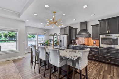 Welcome home to this beautiful 4 bedroom, 3 bath ranch retreat on Toad Valley Public Golf Course in Iowa - for sale on GolfHomes.com, golf home, golf lot