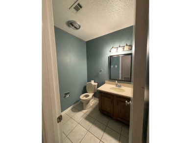 This 3 bedroom home is located in Diamondhead. Wood burning on Diamondhead Country Club in Mississippi - for sale on GolfHomes.com, golf home, golf lot