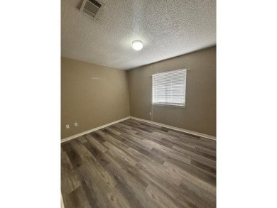 This 3 bedroom home is located in Diamondhead. Wood burning on Diamondhead Country Club in Mississippi - for sale on GolfHomes.com, golf home, golf lot