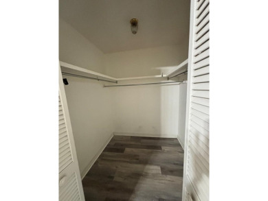 This 3 bedroom home is located in Diamondhead. Wood burning on Diamondhead Country Club in Mississippi - for sale on GolfHomes.com, golf home, golf lot