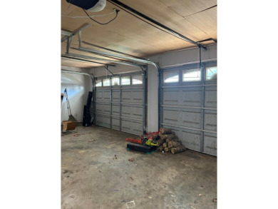This 3 bedroom home is located in Diamondhead. Wood burning on Diamondhead Country Club in Mississippi - for sale on GolfHomes.com, golf home, golf lot