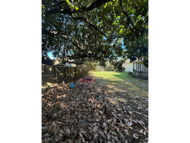 This 3 bedroom home is located in Diamondhead. Wood burning on Diamondhead Country Club in Mississippi - for sale on GolfHomes.com, golf home, golf lot