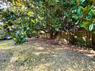 This 3 bedroom home is located in Diamondhead. Wood burning on Diamondhead Country Club in Mississippi - for sale on GolfHomes.com, golf home, golf lot