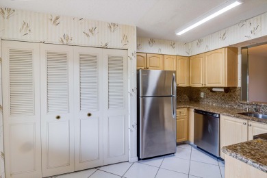 Located in the gated community of Huntington Lakes in Delray on Marina Lakes Golf Course in Florida - for sale on GolfHomes.com, golf home, golf lot