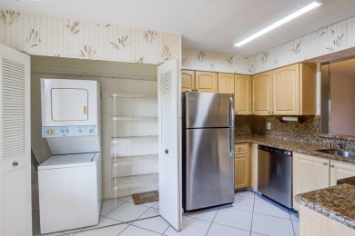 Located in the gated community of Huntington Lakes in Delray on Marina Lakes Golf Course in Florida - for sale on GolfHomes.com, golf home, golf lot