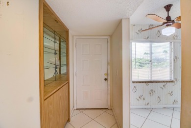 Located in the gated community of Huntington Lakes in Delray on Marina Lakes Golf Course in Florida - for sale on GolfHomes.com, golf home, golf lot