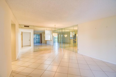 Located in the gated community of Huntington Lakes in Delray on Marina Lakes Golf Course in Florida - for sale on GolfHomes.com, golf home, golf lot