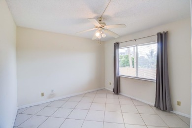 Located in the gated community of Huntington Lakes in Delray on Marina Lakes Golf Course in Florida - for sale on GolfHomes.com, golf home, golf lot