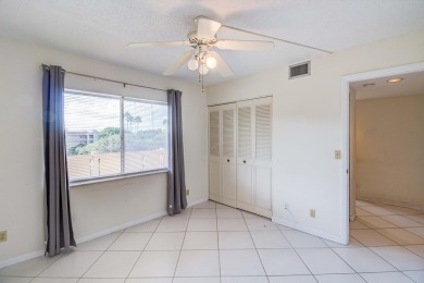 Located in the gated community of Huntington Lakes in Delray on Marina Lakes Golf Course in Florida - for sale on GolfHomes.com, golf home, golf lot