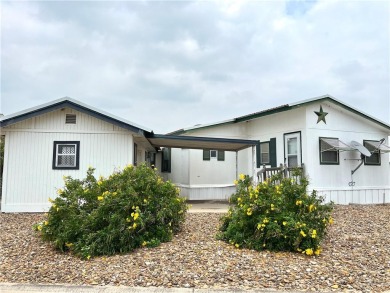 Welcome to this fantastic mobile home situated on a desirable on Howling Trails Golf  in Texas - for sale on GolfHomes.com, golf home, golf lot