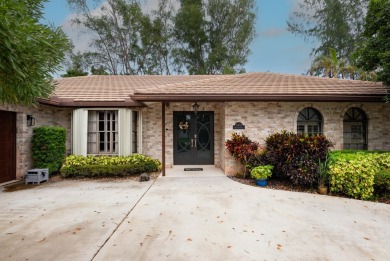 Beautifully updated & rarely available 4 bedroom 2-1/2 bath on Boca Lago Golf and Country Club in Florida - for sale on GolfHomes.com, golf home, golf lot