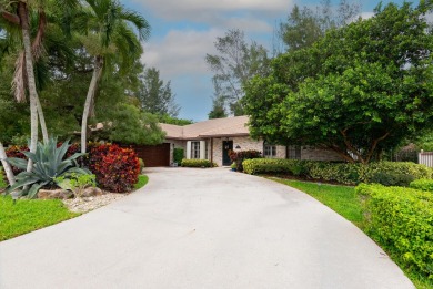 Beautifully updated & rarely available 4 bedroom 2-1/2 bath on Boca Lago Golf and Country Club in Florida - for sale on GolfHomes.com, golf home, golf lot