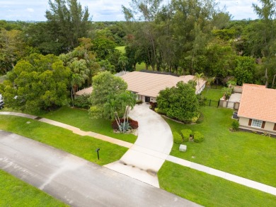 Beautifully updated & rarely available 4 bedroom 2-1/2 bath on Boca Lago Golf and Country Club in Florida - for sale on GolfHomes.com, golf home, golf lot