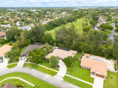 Beautifully updated & rarely available 4 bedroom 2-1/2 bath on Boca Lago Golf and Country Club in Florida - for sale on GolfHomes.com, golf home, golf lot