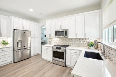 EXQUISITELY RENOVATED 6-BEDROOM POOL HOME IN HUNTER'S GREEN!

 on Hunters Green Country Club in Florida - for sale on GolfHomes.com, golf home, golf lot