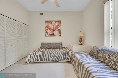 Exceptional Corner Unit Condo nestled in the gated community of on Boca Pointe Country Club in Florida - for sale on GolfHomes.com, golf home, golf lot