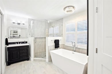 EXQUISITELY RENOVATED 6-BEDROOM POOL HOME IN HUNTER'S GREEN!

 on Hunters Green Country Club in Florida - for sale on GolfHomes.com, golf home, golf lot