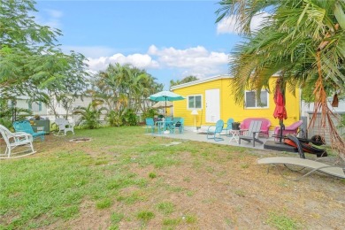 Affordable and move in ready! All new windows, newer metal roof on Barefoot Bay Golf Course in Florida - for sale on GolfHomes.com, golf home, golf lot