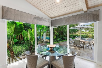 Welcome to this stunning, fully renovated contemporary residence on Bocaire Country Club in Florida - for sale on GolfHomes.com, golf home, golf lot