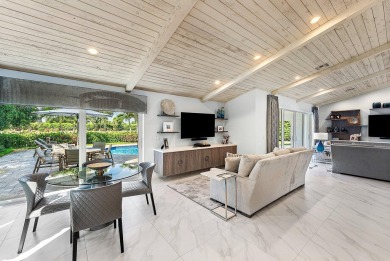 Welcome to this stunning, fully renovated contemporary residence on Bocaire Country Club in Florida - for sale on GolfHomes.com, golf home, golf lot