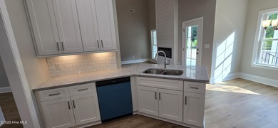 Immaculate new construction by Nelson Adams in popular Country on Ayden Golf and Country Club in North Carolina - for sale on GolfHomes.com, golf home, golf lot