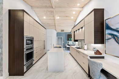 Welcome to this stunning, fully renovated contemporary residence on Bocaire Country Club in Florida - for sale on GolfHomes.com, golf home, golf lot