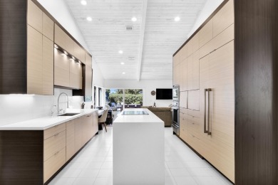 Welcome to this stunning, fully renovated contemporary residence on Bocaire Country Club in Florida - for sale on GolfHomes.com, golf home, golf lot