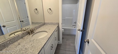 Immaculate new construction by Nelson Adams in popular Country on Ayden Golf and Country Club in North Carolina - for sale on GolfHomes.com, golf home, golf lot