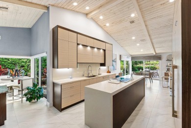Welcome to this stunning, fully renovated contemporary residence on Bocaire Country Club in Florida - for sale on GolfHomes.com, golf home, golf lot