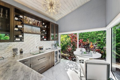 Welcome to this stunning, fully renovated contemporary residence on Bocaire Country Club in Florida - for sale on GolfHomes.com, golf home, golf lot