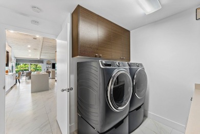 Welcome to this stunning, fully renovated contemporary residence on Bocaire Country Club in Florida - for sale on GolfHomes.com, golf home, golf lot